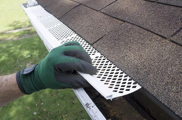 gutter guards can help eliminate the need for regular gutter cleaning by keeping out debris